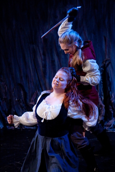 Lady Macduff (Rachel Stubbs) is murdered by Lenox (Gillian N. Humiston) Photo